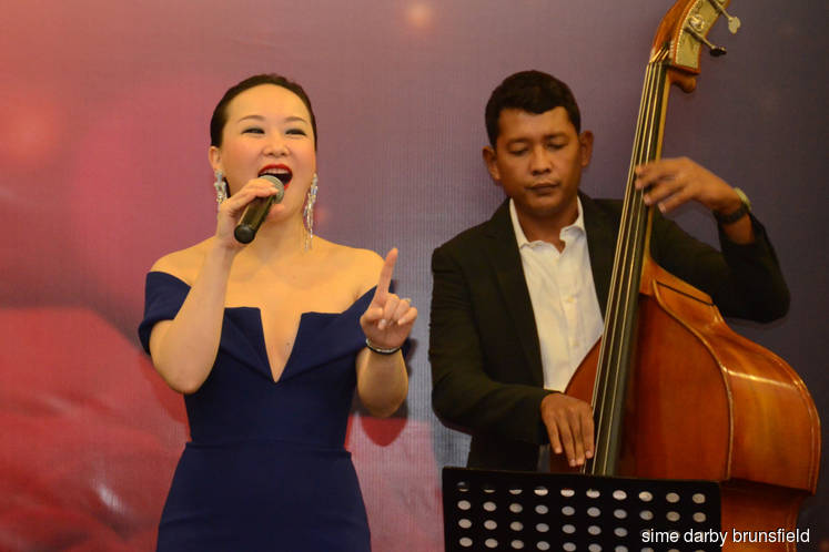 Sime Darby Brunsfield’s guests entertained by singer from Crazy Rich Asians